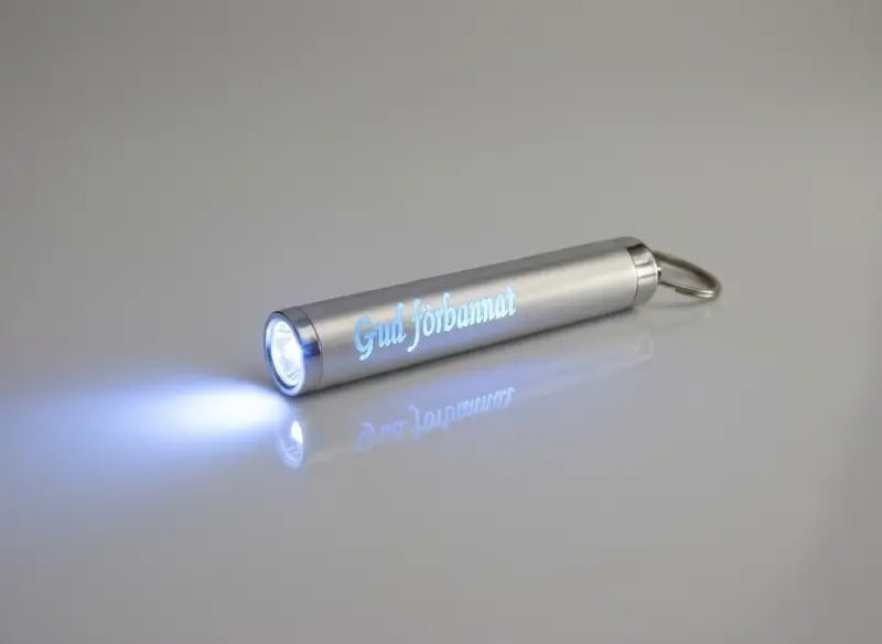 Ficklampa nyckelring - Gud Förbannat - ByEngwek