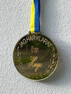 Medalj | 0:an - Express - presenter