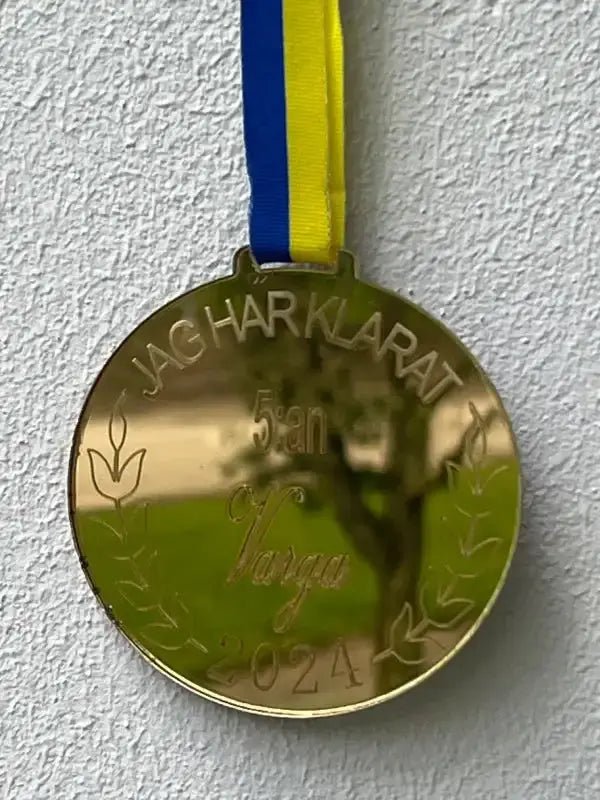 Medalj | 5:an - Express - presenter