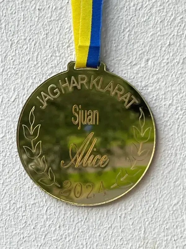 Medalj | sjuan - Express - presenter