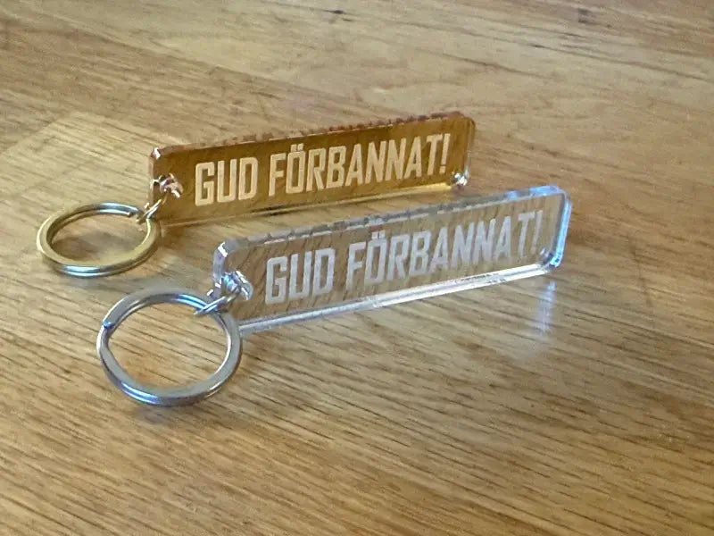 Nyckelring | “Gud förbannat” i Silver spegelplast - Engwek.se