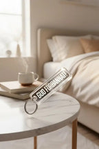 Nyckelring | GUD FÖRBANNAT - Express - presenter