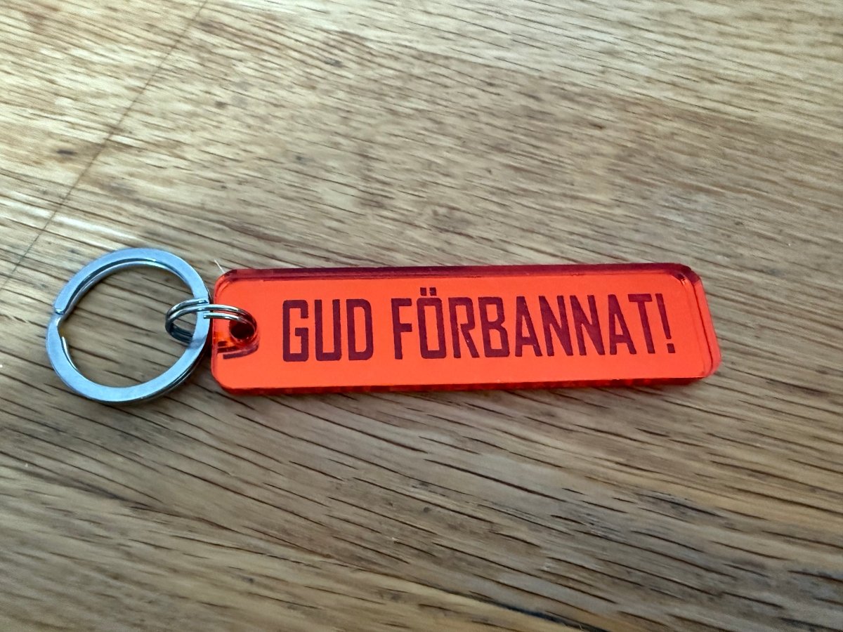 Nyckelring | “Gud förbannat” i Orange spegelplast - ByEngwek