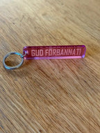 Nyckelring | “Gud förbannat” i Rosa spegelplast - ByEngwek