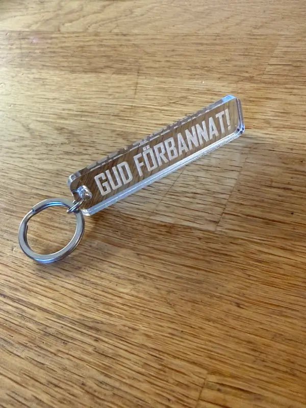 Nyckelring | “Gud förbannat” i Silver spegelplast - ByEngwek