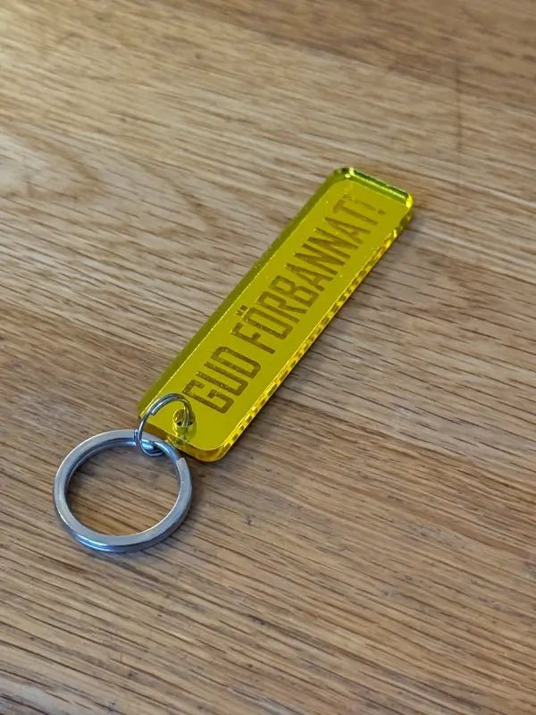 Rolig nyckelring ”Gud förbannat” – Svensktillverkad present - Engwek.se